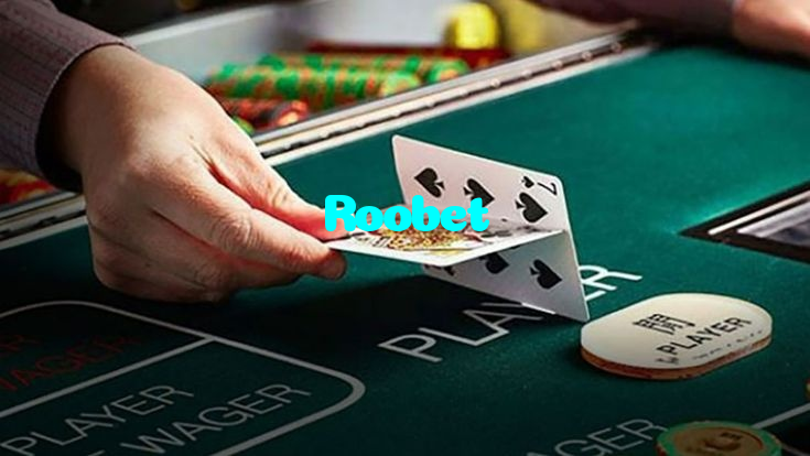 Roobet casino presented on mobile device in Pakistan with slots and live games